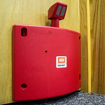 Union Wireless Fire Door Holder Red - In Situ