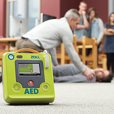 Man using Zoll AED Defibrillator